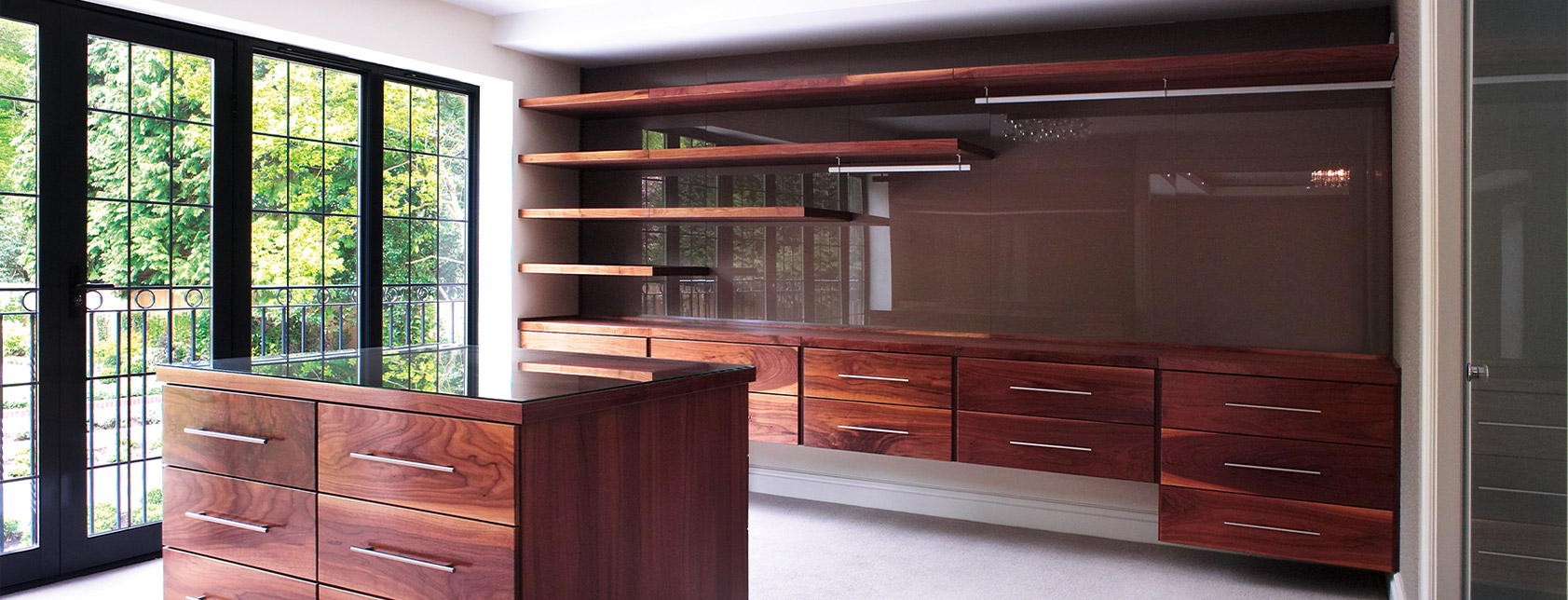 Custom walk-in wardrobes with free-floating drawers and shelves